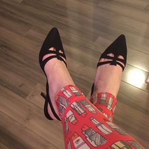 Manolo Blahnik black leather sling back heel